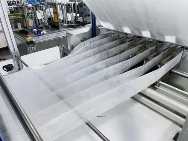 12KW Automatic Filter Bag Sewing Machines 220V Automatic Production Of Medium Efficiency Filter Bags
