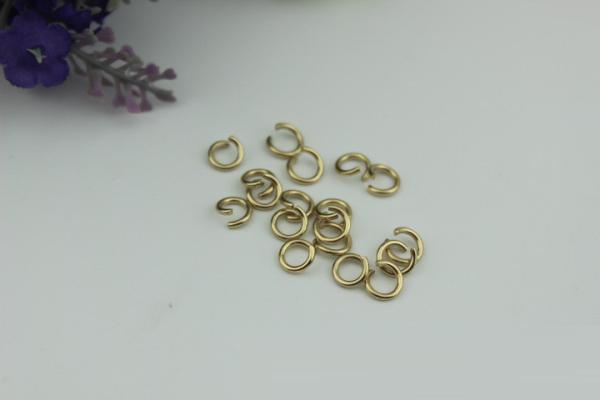 Manufacturing cheap fashion light gold small wire iron round metal buckles 5 mm