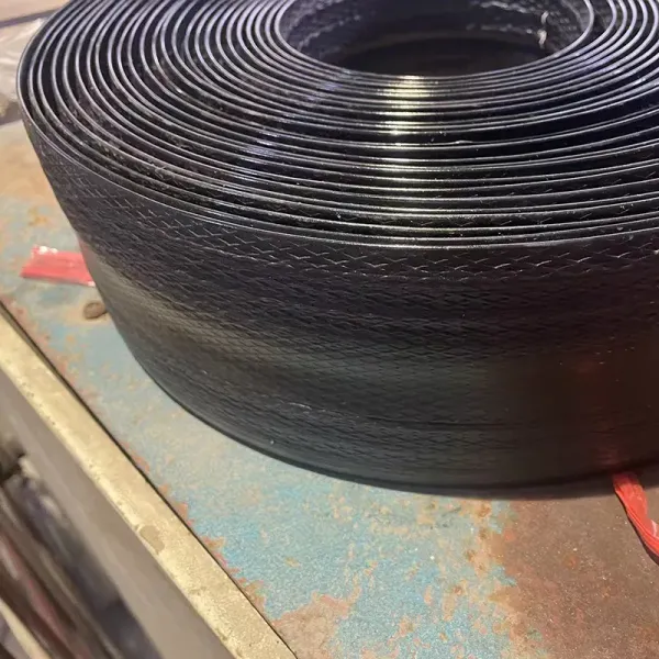 Cost-Effective Polymeric Geocomposite Strip Geogrid for Reinforced Soil Structures