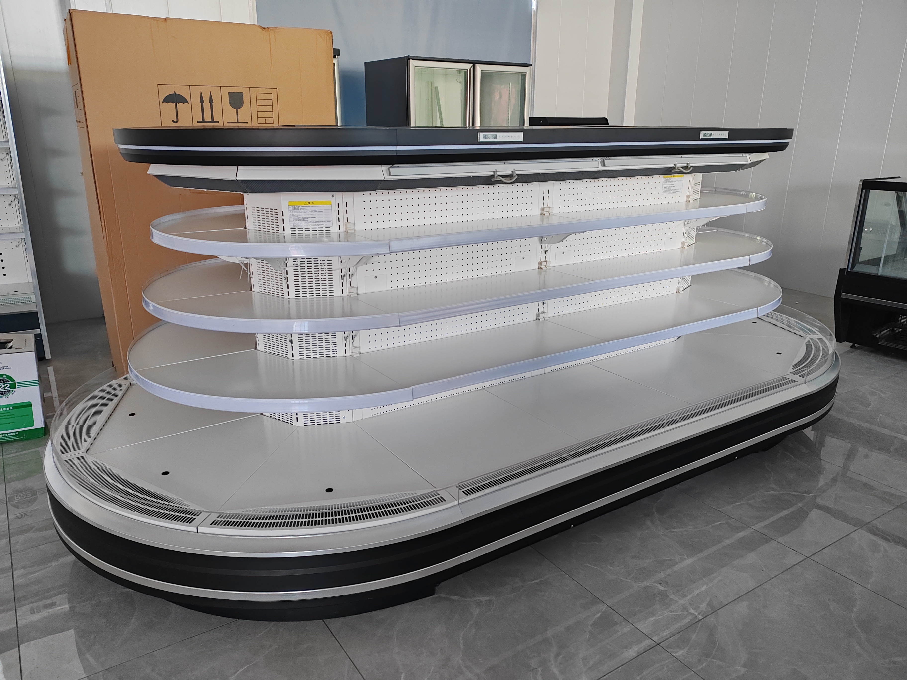 Refrigerated Modular Chilled Island Display Case equipped with Adjustable Shelves and LED Lighting supporting retail display setups