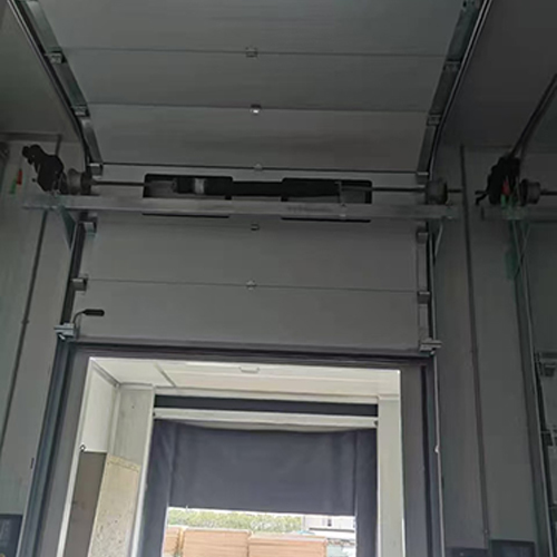 24dB Insulated Custom Vertical-Lift Industrial Sectional Overhead Door For Facility Applications