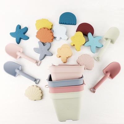 Areia das crianças de Toy Bucket Set Beach Toy do bebê do silicone das vendas por atacado que joga o brinquedo da cubeta da praia do chuveiro do molde