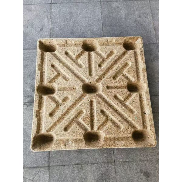 Durable compressed wood pallets with expansion rate below 5 percent suitable for long distance transportation and internal