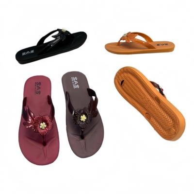 EVA Women Solid Color Flip Flops With 3D Flower Accent And Brand Mark
