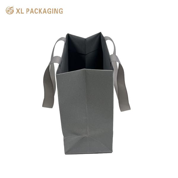 Luxury Gray Paper Gift Bag with Custom Logo, Textured Heavy-Duty Cardstock and Ribbed Fabric Handles for Boutique Packaging