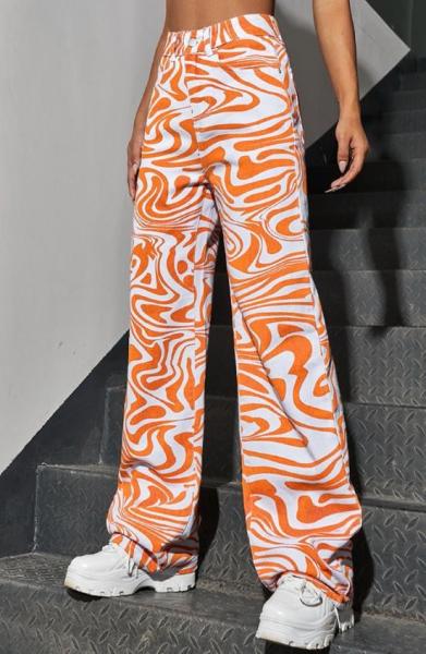 O pé largo alto do Waisted das mulheres da fábrica da roupa da quantidade pequena imprime calças entufados ocasionais da sarja de Nimes das calças de brim