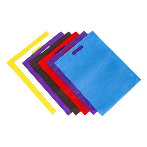 La coupe non tissée écologique non tissée colorée manipulée des sacs réutilisables D portent le sac