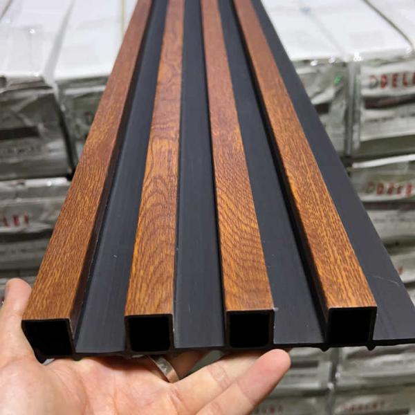 Decoración de interiores impermeable y resistente a la erosión Paneles de pared de PVC WPC