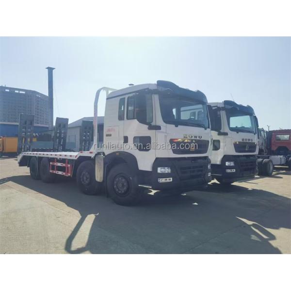 Grande capacité 12 roues 20 tonnes 25 tonnes Excavateur de transfert Howo camion de transport à lit plat