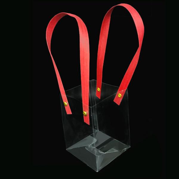 Fabrique en gros personnalisé simple transparent transparent PVC sac cadeau à main sac d'emballage en plastique avec manche