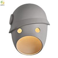 Lampe de mur créative nordique de masque pour le bas-côté de chambre à coucher de salon d'hébergement chez l'habitant