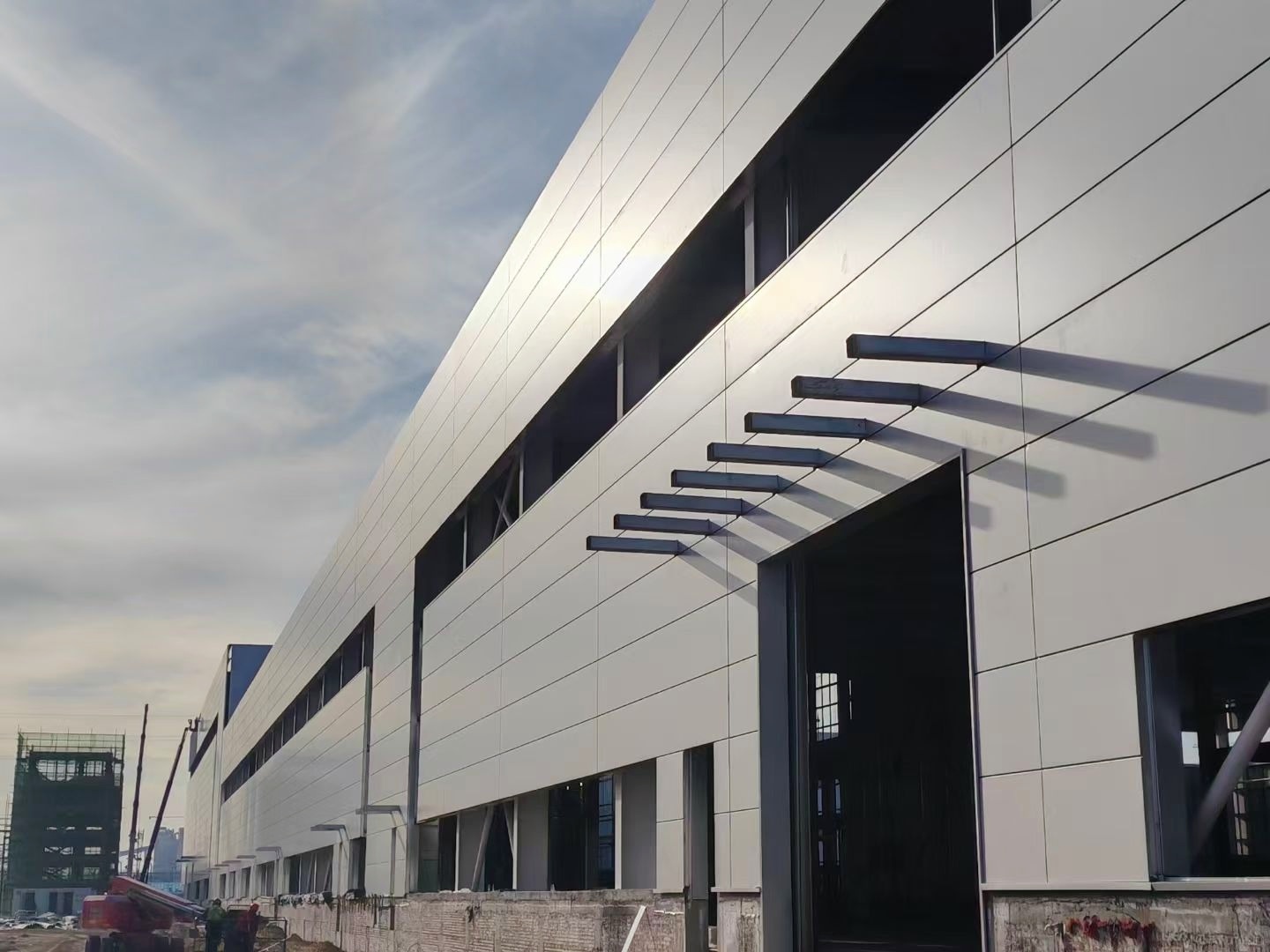 Heavy Load Bearing Prefabricated Steel Warehouse For Raw Material Stock Storage