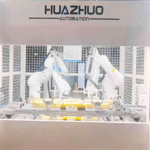 Dual Robot Clip Insertion Cell For Automotive Parts Assembly