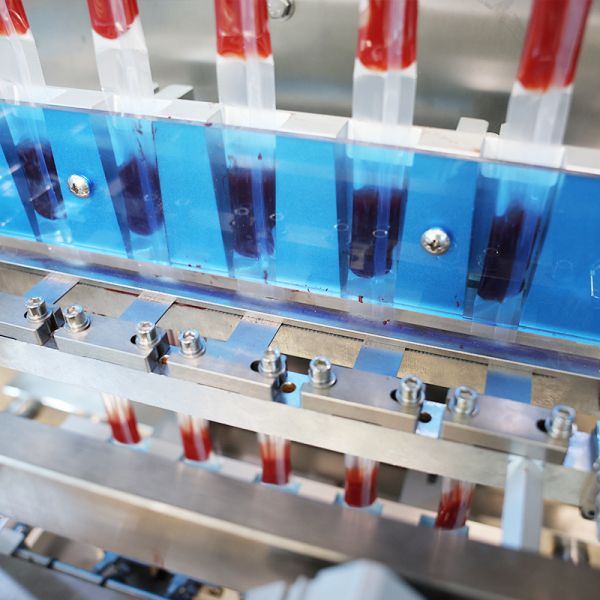 High Efficient Multi Lanes Popsicle Making Machine Liquid Pure Water Honey Juice Ice Lolly Packaging Filling Machine