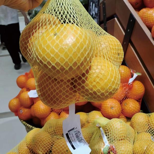 Machine d'emballage automatique en filet avec fonction de clip pour légumes (pommes de terre, oignons, ail, oranges) - Machine d'emballage en filet