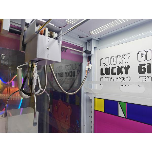 Factory Price Wholesale Kids Transparent Claw Machine with Lucky Gift Box Plush Toy Crane Game