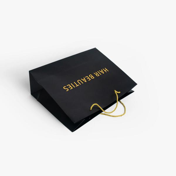 CMYK Bolsa de regalo de compras Partone para diseño personalizado 250 Gsm Art Papel de ropa embalaje