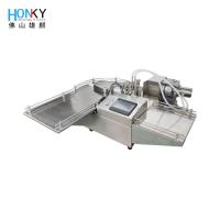 Botella redonda de 30 ml Máquina de llenado de líquido con tapa de mesa Semiautomática con bomba de pistón cerámico para llenado de líquido