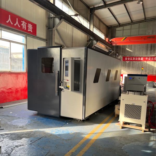Industrial Double Table Model 6000w Sheet Metal Laser Cutting Machine with 4-axis Configuration and Yaskawa Servo Motor