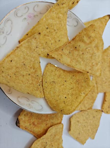 Des chips au maïs au goût de tomate pour les amateurs de collation savoureuse
