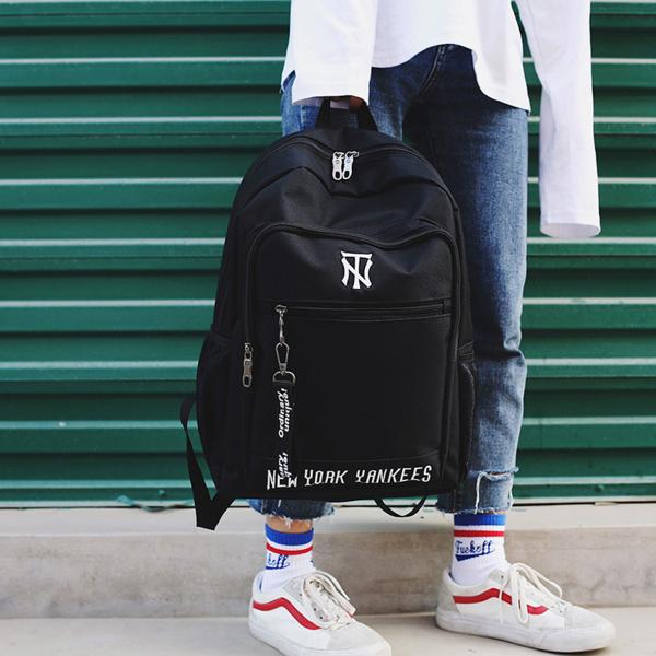 Korean version of cool letters backpack students fashion large capacity schoolbag waterproof casual backpack girl