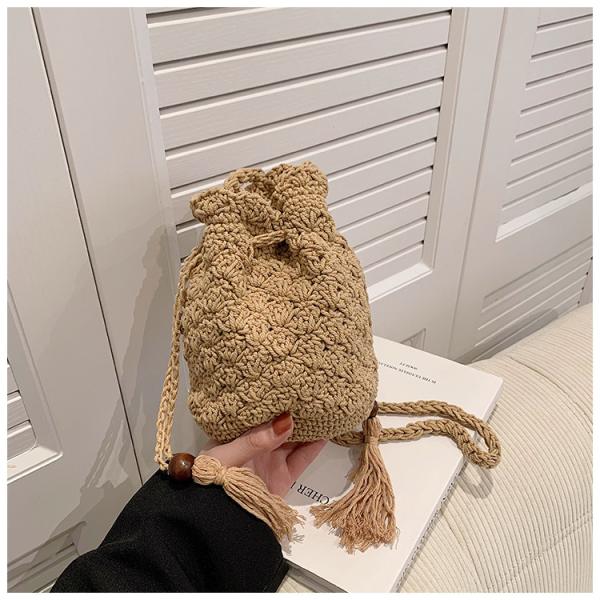 Hot Sale Women Hollow Out Crochet Knit Summer Handbags Straw Woven Portable Raffia Beach Holiday Tote Bag Raffia Paper Rope Crochet Straw Bag for Seaside Vacation Trips Shopping and Shopping