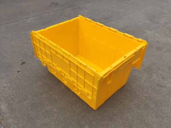 Yellow Plastic Storage Bins Attached Lids Stacked For Transportation