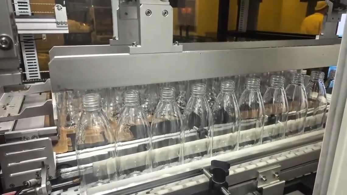 Fully Automatic Bottle Packing Machine With Flexible Size Parameters Rapid Changeover And 10,000 Bottles Per Hour Capacity