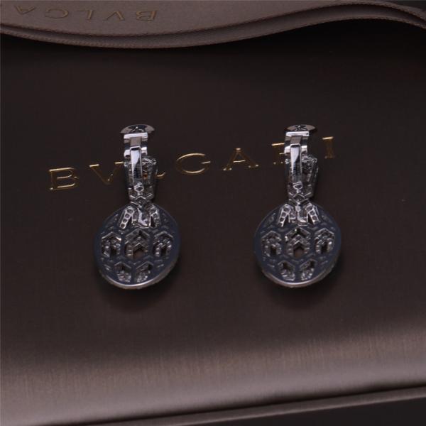 Роскошные серьги Serpenti бренда золота в наборе белого золота 18K с изумрудными глазами и с головой змейки диамантов pavé