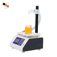Honey Filling Machine de acero inoxidable 240 botellas por hora Honey Bottling Equipment