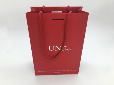 Red Bottom Folding Branded Paper Bags With Cotton Rope , Silver Foil Logo