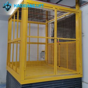 Unmovable Hydraulic Scissor Lift: Hydraulic smooth lifting, perimeter shields , easy push-button control, durable steel—ideal for factory heavy tasks.