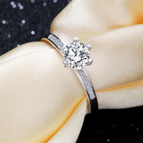 Women Brilliant Cubic Zircon Sterling Silver Engagement Ring (RE118)