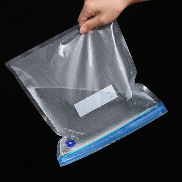 O curso plástico do vácuo do saco da poupança do espaço do aferidor do fecho de correr do melhor PE transparente do PA da venda comprimiu o saco liso do armazenamento do vácuo