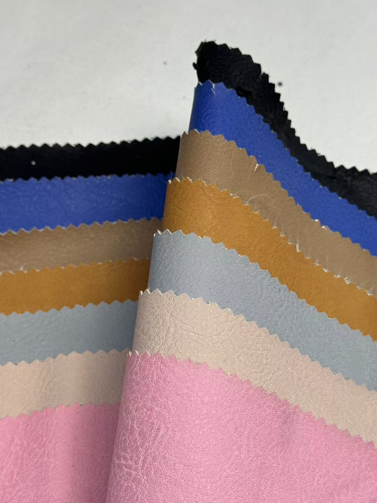 New Design Embossed PU Synthetic Waterproof Leather Fabric with Elastic for Garment Jacket Upholstery