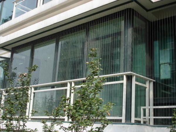 Balcony Invisible Grille transparent mesh safety solution combining durability and aesthetic appeal for modern buildings