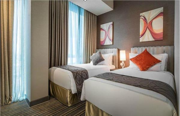 Hotel style apartment interior design of Laminated furniture for Wall mounted cabinet and Upholstered headboard bed