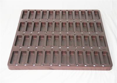 Os queques da forma do retângulo de 48 copos de PTFE moldam a bandeja