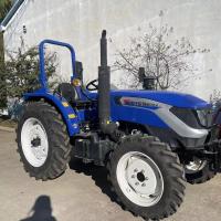 Tracteur agricole à quatre roues de ferme avec le tracteur de Front End Loader And Digger