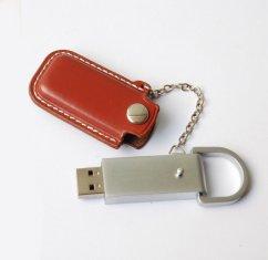 Movimentação 005 do flash de USB da caixa do metal e do couro