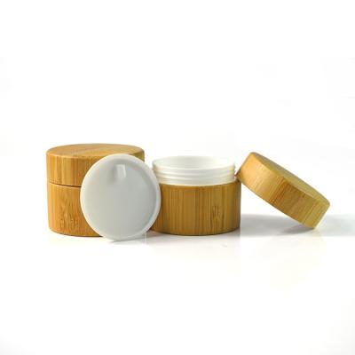 O creme de vidro claro de 5G 15G range o empacotamento do cosmético geado com a tampa de bambu