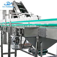Conveyor de transporte de garrafas sem pressão com materiais de atrito aprimorados