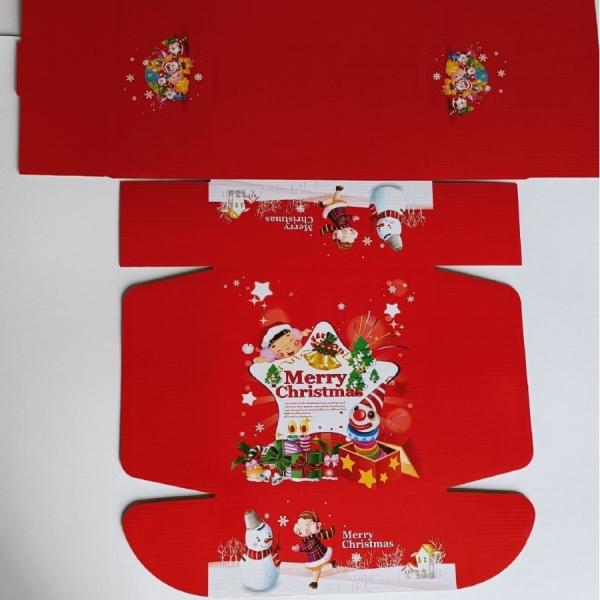 Boîte d'expédition en carton ondulé de Noël avec impression festive pour cadeaux et emballage e-commerce