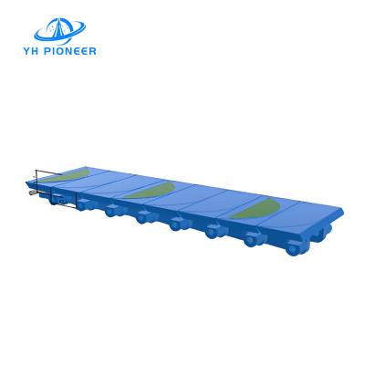 Cadeia dentada flexível sem costura com superfície de borracha para soluções de transporte industrial versáteis