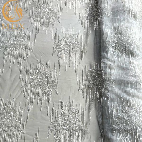 O brilho bordado branco bonito ata o poliéster da tela MDX 20% para vestidos
