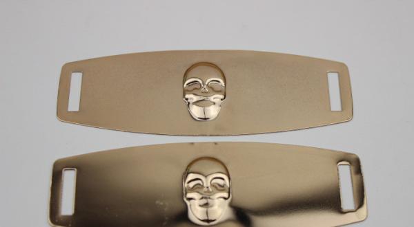 Eco-friendly plating iron sheets gold color embossed skull logo shoe metal buckles for shoelace