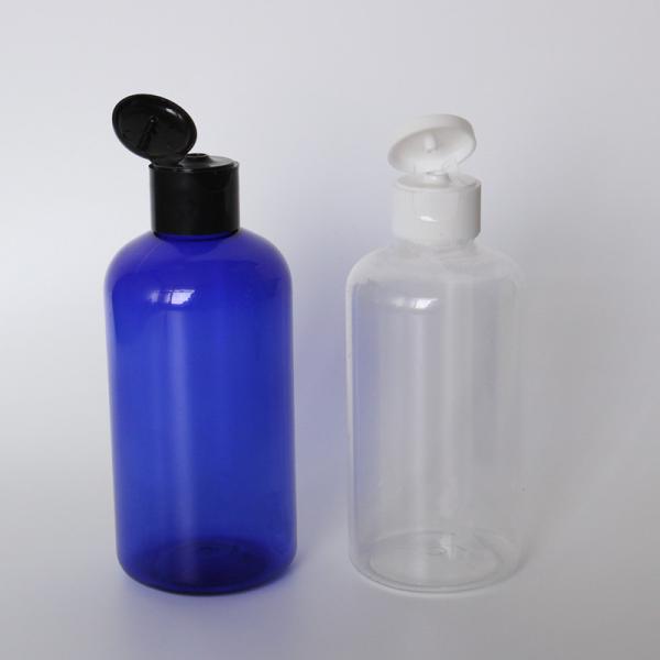 Las botellas plásticas del ANIMAL DOMÉSTICO 100ML despejan las botellas de ronda de Cosmo con los casquillos naturales del top del disco