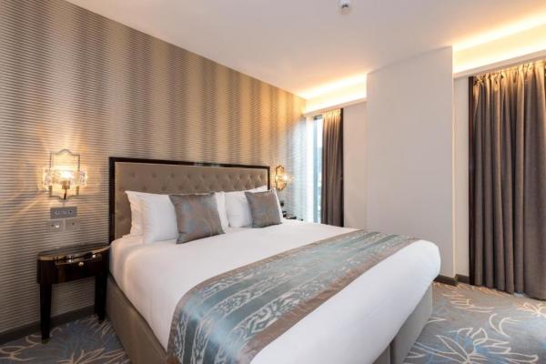 Melaka light luxury hotel room design of guestroom furniture by Stainless steel leather headboard bed with fashion table
