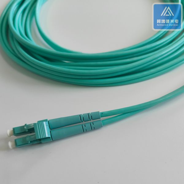 Duplex MM Armored Zipcord Patch Jumper 3.0mm x 2pcs Aque LSZH with DLC Connector