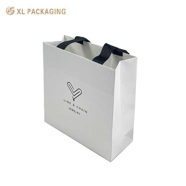 White Kraft Jewelry Paper Gift Bags Recyclable Paper Bags With Black Ribbon Handles For Jewelry